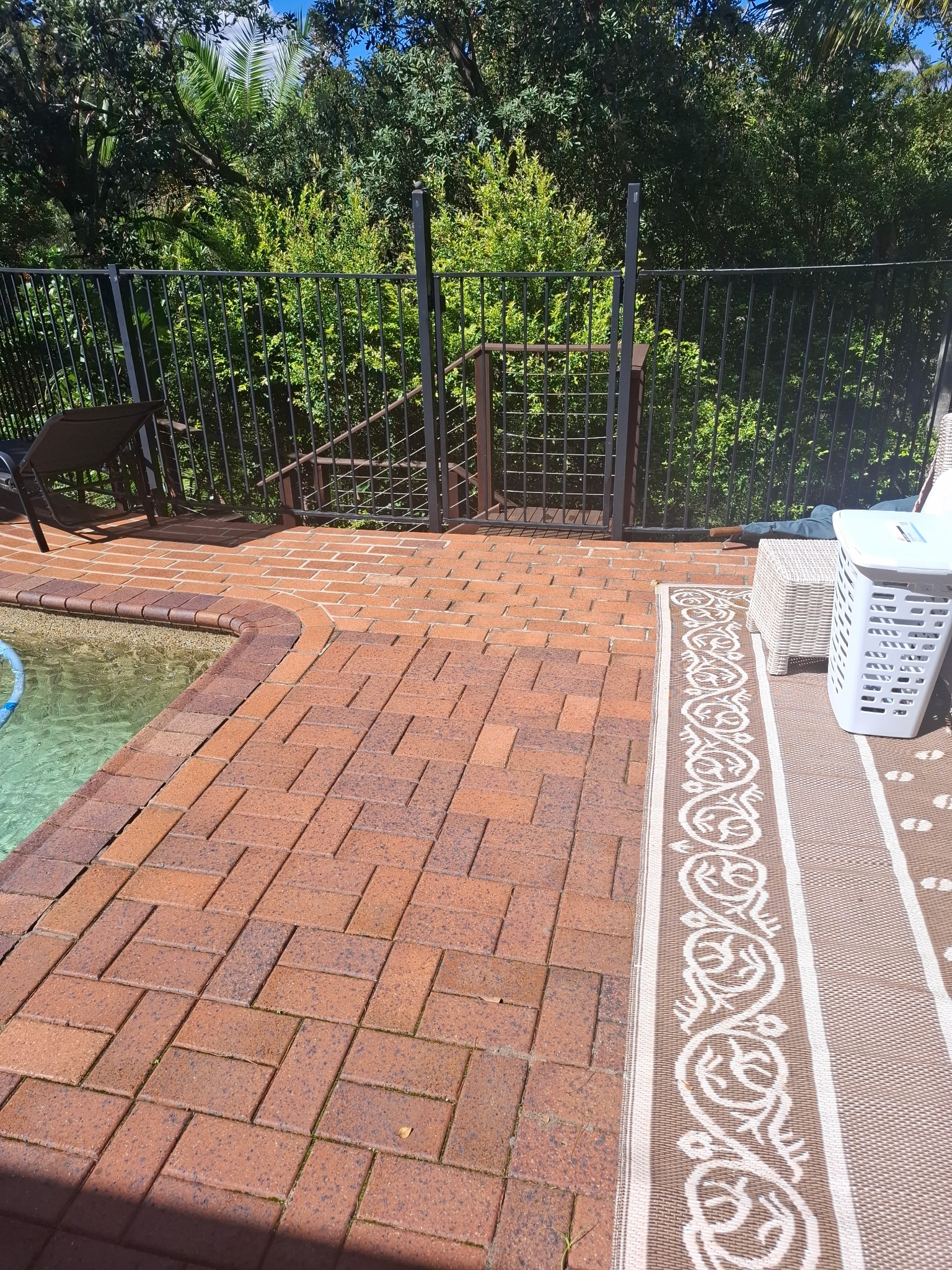 Pool deck with brick pavers